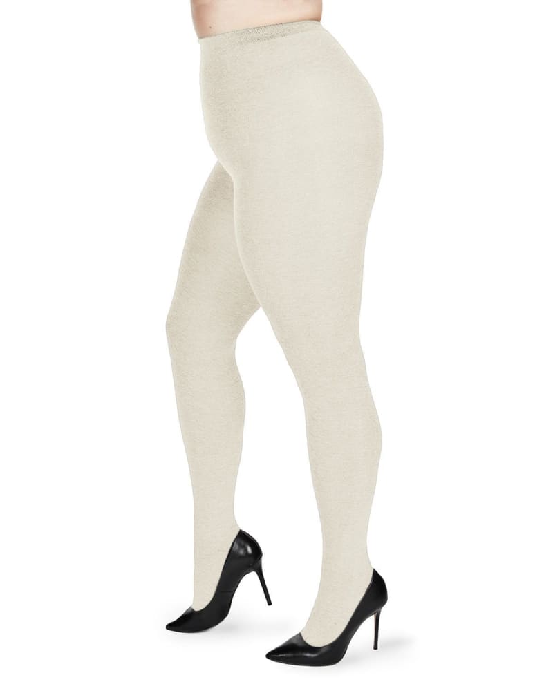 Side of a model wearing a size 1X-2X Brooklyn Flat Knit Cotton Blend Sweater Tights in Winter White by Memoi. | dia_product_style_image_id:299631